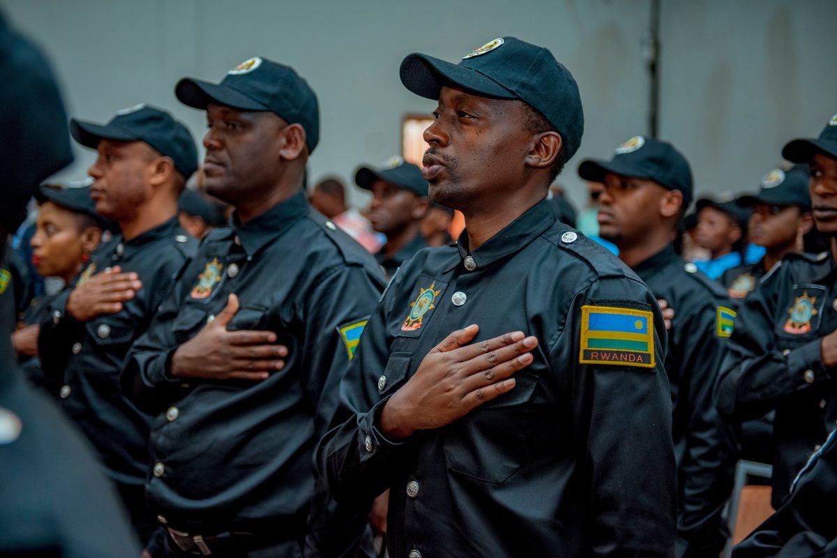 Uniformed officers standing in formation at a ceremony